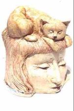 Cat on Woman's Head